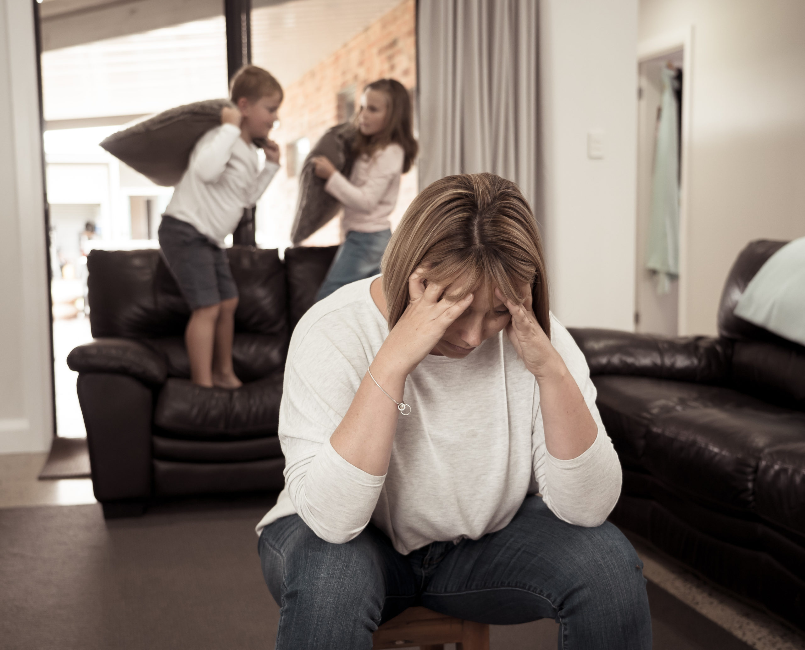 COVID-19 Lockdown. Overwhelmed Parents struggling with stressed kids at home in quarantine